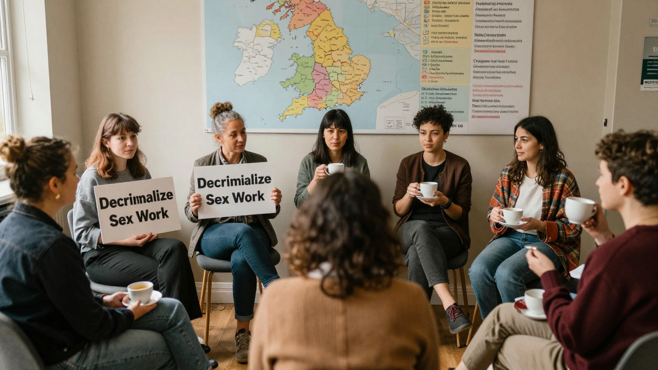 A group of people in a community center gather together, sharing stories with signs advocating for sex worker rights.